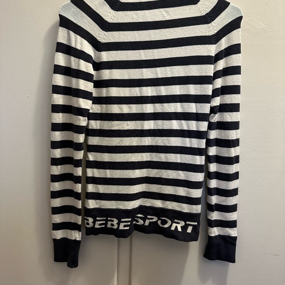 Bebe Women's Ribbed Zip Front Sweater with Fold Over Collar - Picture 5 of 5